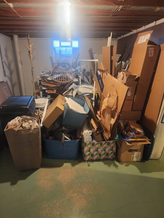 Roll-off dumpster container at job site for 2 Yard Dumpster Rental in Brimfield